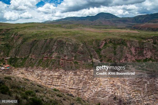 view of maras salt mine terrace near cuzco in peru - moray cusco fotografías e imágenes de stock