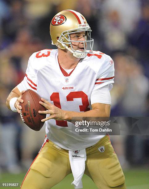 Shaun Hill of the San Francisco 49ers scrambles with the ball during an NFL game against the Minnesota Vikings at the Hubert H. Humphrey Metrodome,...