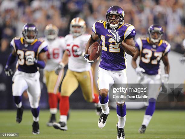 Percy Harvin of the Minnesota Vikings breaks loose for a touchdown during an NFL game against the San Francisco 49ers at the Hubert H. Humphrey...