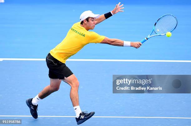 Jordan Thompson of Australia plays a backhand volley during a practice session ahead of the Davis Cup World Group First Round tie between Australia...