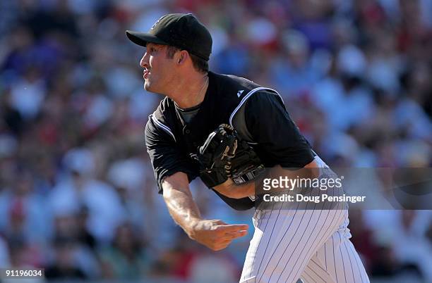 Relief pitcher Huston Street of the Colorado Rockies delivers against the St. Louis Cardinals at Coors Field on September 27, 2009 in Denver,...