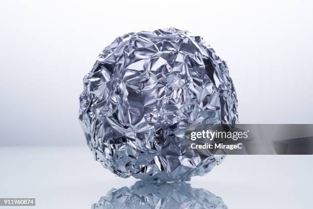 foil ball close-up shot - crumpled stock pictures, royalty-free photos & images