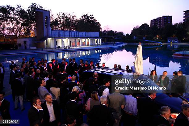 Italian Prime Minister Silvio Berlusconi leaves after speaking at the Italian Party Of Freedom Festival on September 27, 2009 in Milan, Italy. This...