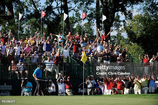 Phil Mickelson chips in for birdie on during the final round of THE TOUR Championship presented by Coca-Cola, the final event of the PGA TOUR...
