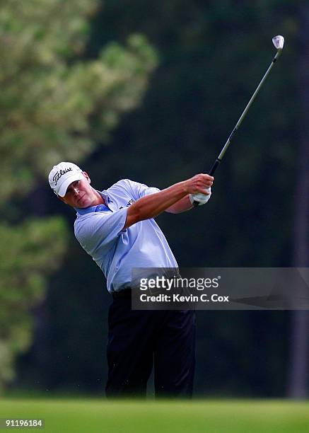 Steve Stricker plays his second shot from the eighth fairway during the final round of THE TOUR Championship presented by Coca-Cola, the final event...