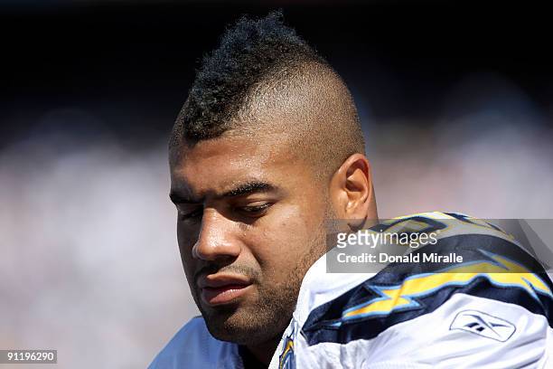 Shawne Merriman of the San Diego Chargers look on from the sideline against the Miami Dolphins v San Diego Chargers NFL Game at Qualcomm Stadium on...