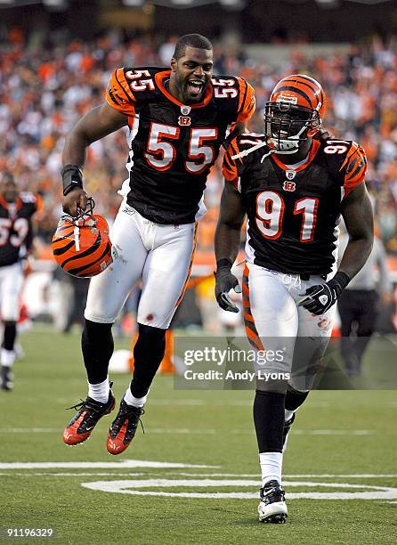 Keith Rivers and Robert Geathers of the Cincinnati Bengals celebrates following the game against the Pittsburgh Steelers at Paul Brown Stadium on...