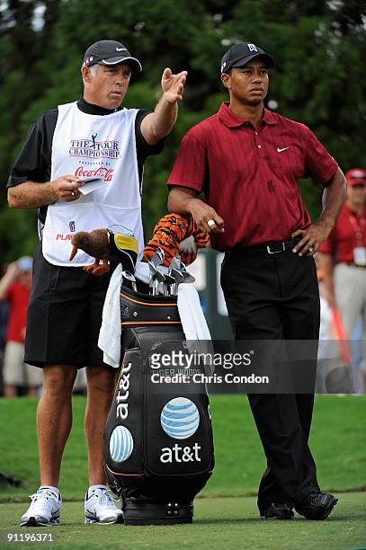Tiger Woods waits to tee off on during the final round of THE TOUR Championship presented by Coca-Cola, the final event of the PGA TOUR Playoffs for...