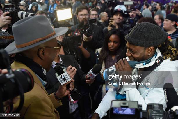 Actor and comedian J.B. Smoove interviews Jay Ajayi of the Philadelphia Eagles during SuperBowl LII Media Day at Xcel Energy Center on January 29,...