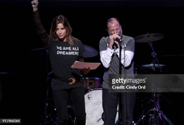 Actors Gina Gershon and Fisher Stevens speak onstage at The People's State Of The Union at Townhall on January 29, 2018 in New York City.
