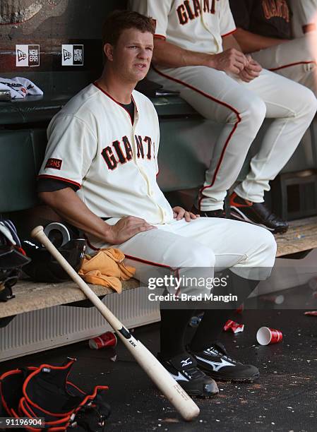 Matt Cain of the San Francisco Giants sits in the dugout during the game against the Chicago Cubs at AT&T Park on September 27, 2009 in San...