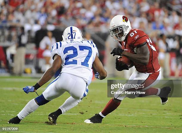 Anquan Boldin of the Arizona Cardinals runs after the catch against Jacob Lacey of the Indianapolis Colts in the second quarter during the game at...