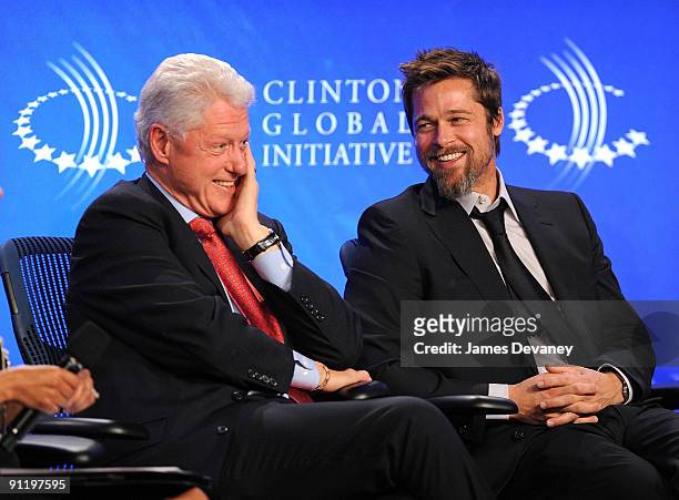 Former President Bill Clinton and actor Brad Pitt host an infrastructure special session during the 2009 Clinton Global Initiative at the Sheraton...
