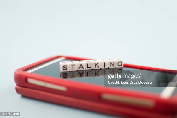 some people are using their mobile phones for making stalking to other people - nachsteller stock-fotos und bilder