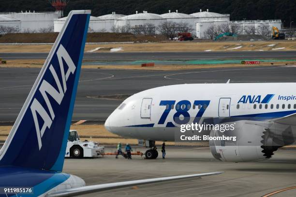 All Nippon Airways Co. Aircraft stand parked at Narita Airport in Narita, Chiba Prefecture, Japan, on Sunday, Jan. 28, 2018. ANA is scheduled to...