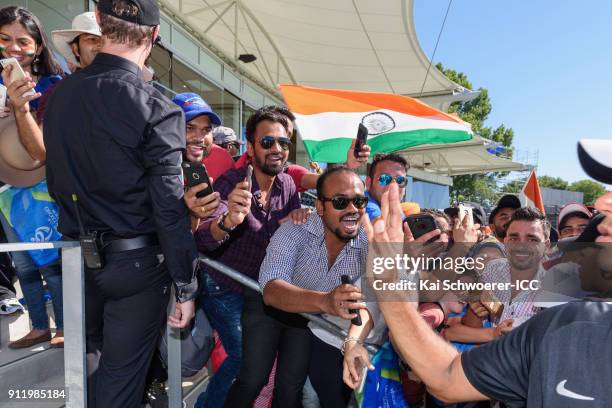 India fans react as Head Coach Rahul Dravid of India greets them after the win in the ICC U19 Cricket World Cup Semi Final match between Pakistan and...