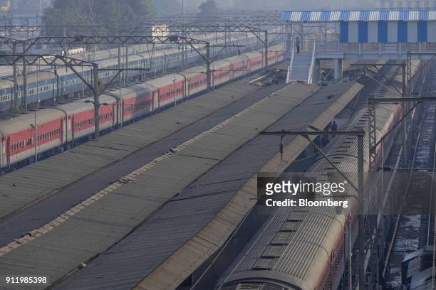 Trains sit at Lokmanya Tilak Terminus in the Kurla suburb of Mumbai, India, on Sunday, Jan. 28, 2018. Mumbai's suburban railway, the oldest in Asia,...