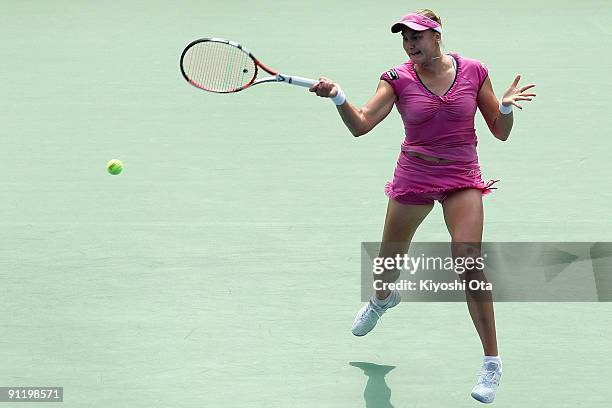 Nadia Petrova of Russia returns plays a forehand in her first round match against Ai Sugiyama of Japan on day two of the Toray Pan Pacific Open...