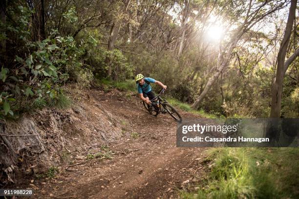 mountain biking in mount kosciuszko national park, australia - thredbo stockfoto's en -beelden