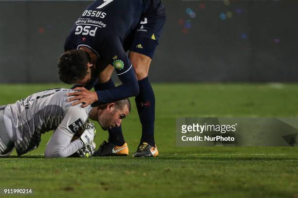 Belenenses's defender Sasso hugs Belenenses's goalkeeper Filipe Mendes after he saved the penalty kick during the Portuguese League football match...