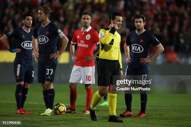 Portuguese Referee Bruno Paixao consults the video assistant during the Portuguese League football match between CF Belenenses and SL Benfica at...