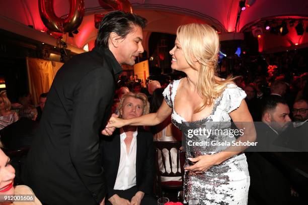 Marcus Schenkenberg greets his former girlfriend Pamela Anderson during the 20th Lambertz Monday Night 2018 at Alter Wartesaal on January 29, 2018 in...