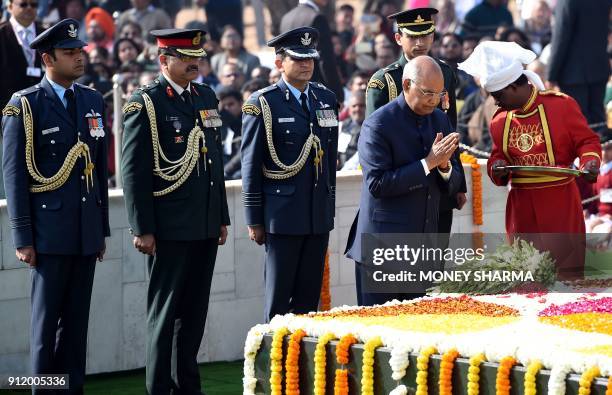 Indian President Ram Nath Kovind pays homage at Rajghat, the memorial for Indian independence icon Mahatama Gandhi, on Martyr's Day to mark the 70th...