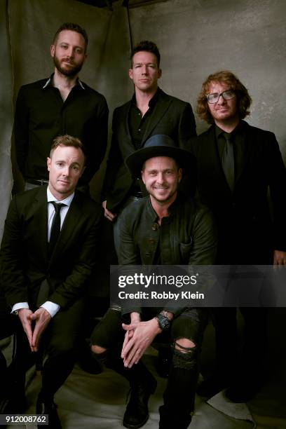 Musicians Brent Kutzle, Zach Filkins, Drew Brown Eddie Fisher and Ryan Tedder of One Republic pose for a photo during MusiCares Person of the Year...