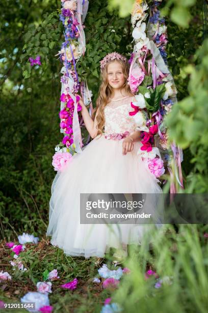 cinderella on the swing - latvia girls stock pictures, royalty-free photos & images
