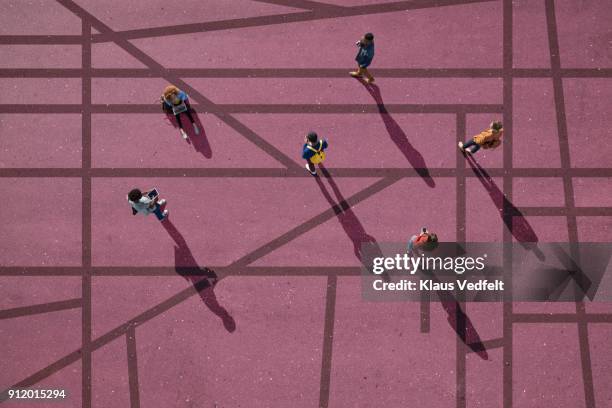 group of people standing & sitting on roads, painted on asphalt - decisions fotografías e imágenes de stock