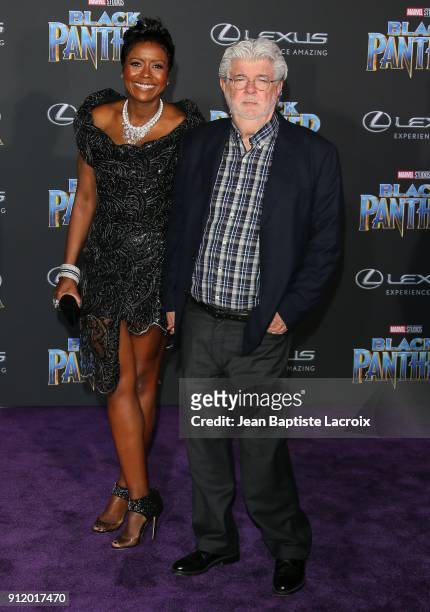 Mellody Hobson and George Lucas attend the premiere of Disney and Marvel's 'Black Panther' on January 28, 2018 in Los Angeles, California.