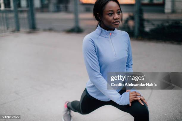 warming up for a workout - warming up for exercise stock pictures, royalty-free photos & images