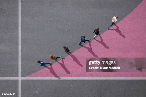 businesspeople walking on painted up going graph, on asphalt - 機会 ストックフォトと画像