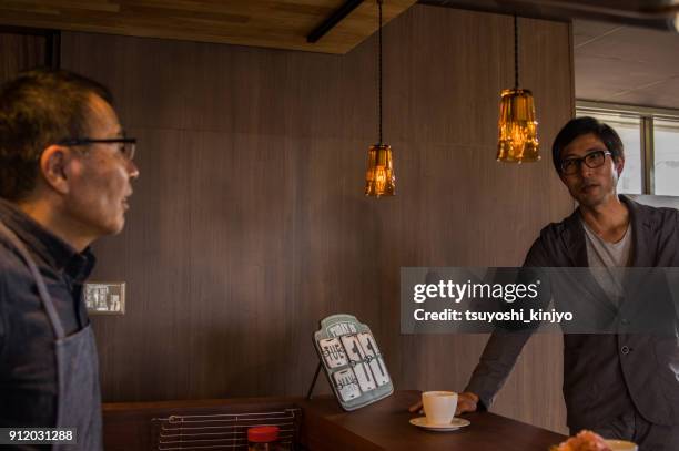 businessman refresh time,cafe,master - narrator stock pictures, royalty-free photos & images