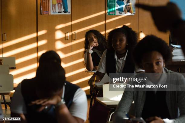 Gabriela Cintron back row, listens to the teacher during an 8th grade math class at Escuela Intermedia Jesusa Vizcarrondo in Loiza, Puerto Rico. The...