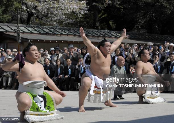 Mongolian sumo grand champion Asashoryu offers a ritual entrance into the ring during the "Honozumo," a ceremonial sumo tournament, at the Yasukuni...
