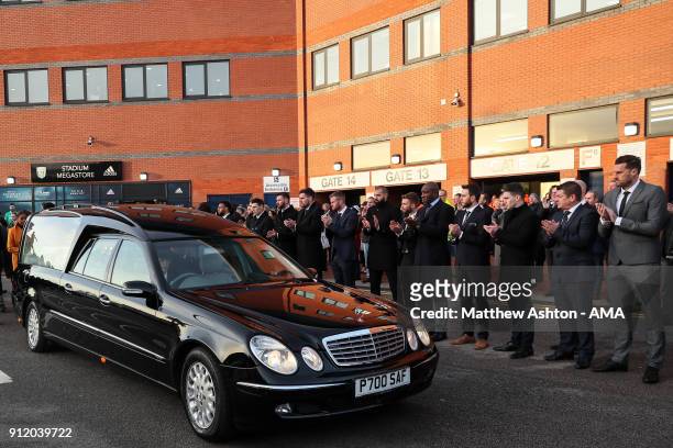 Fans, Staff and Players of West Bromwich Albion applaud as the Hearse arrives during the Cyrille Regis Memorial Service at The Hawthorns on January...