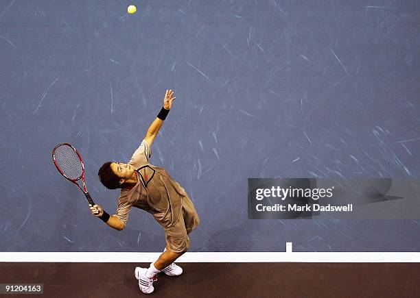 Go Soeda of Japan hits a serve in his match against Marco Chiudinelli of SUI during day three of the 2009 Thailand Open at Impact Arena on September...