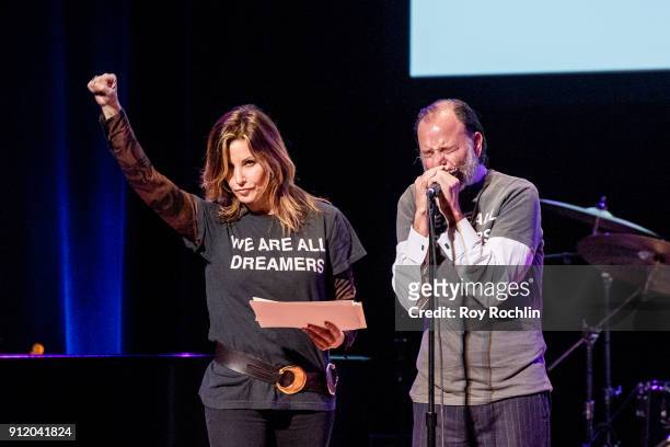 Actors Gina Gershon and Fisher Stevens speak onstage during The People's State Of The Union at Town Hall on January 29, 2018 in New York City.