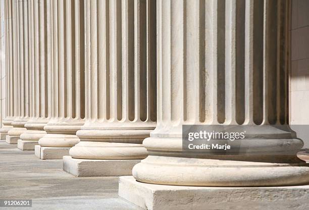 row of columns - bank columns stockfoto's en -beelden