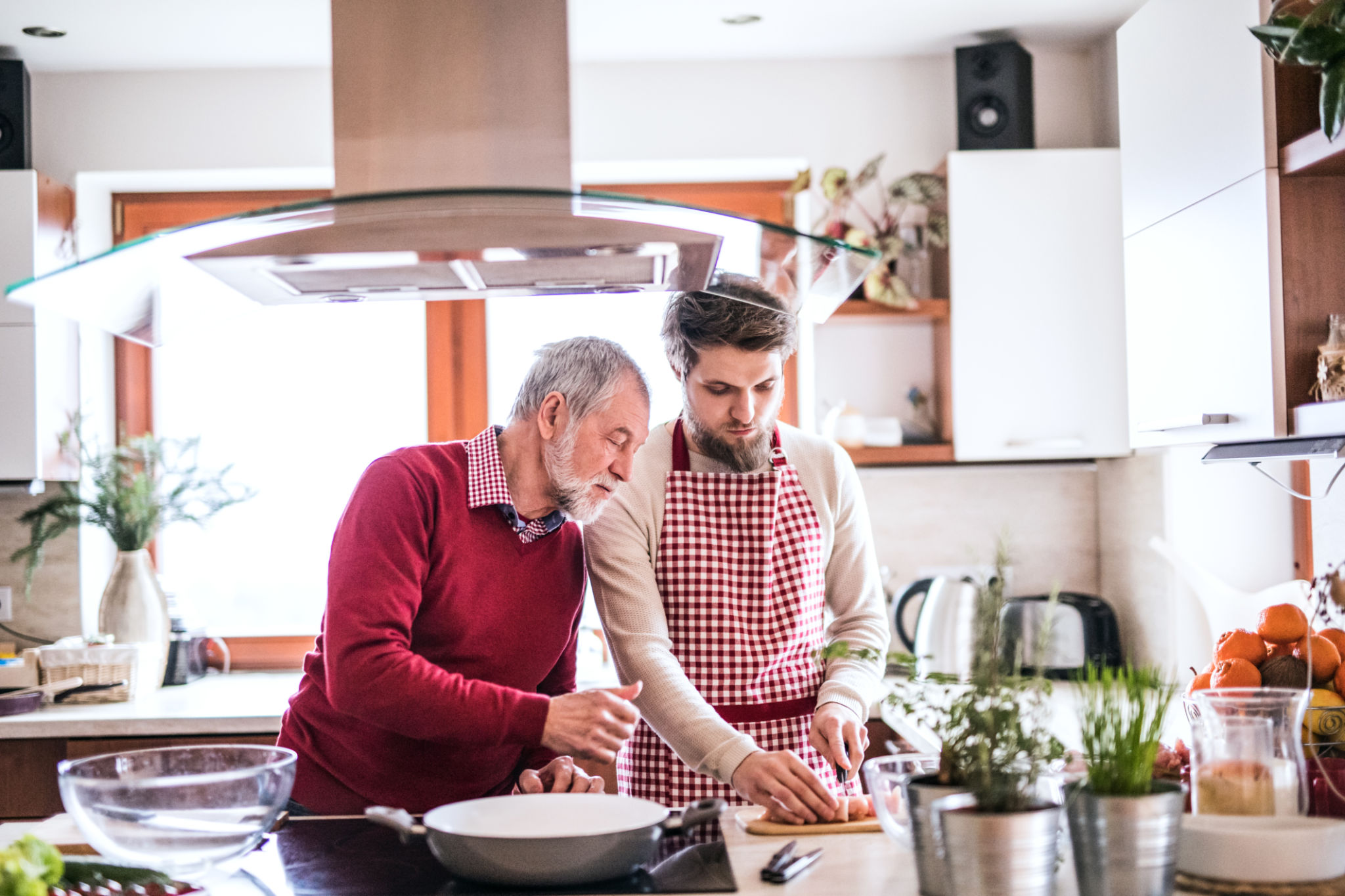 father son cooking