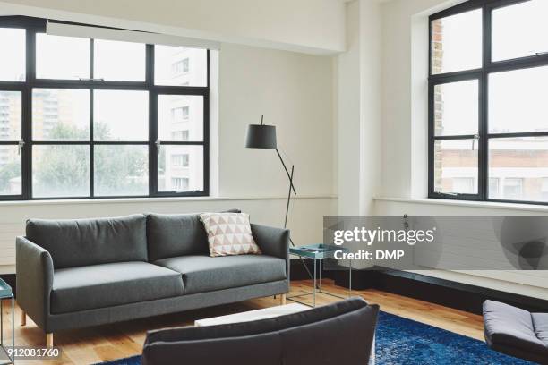 bright living room - small apartment stock pictures, royalty-free photos & images