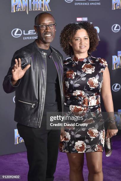 Don Cheadle and Bridgid Coulter attend the Premiere Of Disney And Marvel's "Black Panther" - Arrivals on January 29, 2018 in Hollywood, California.