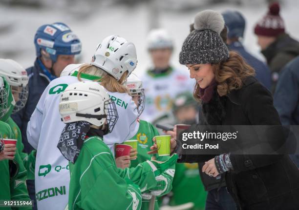 Catherine, Duchess of Cambridge and Prince William, Duke of Cambridge visit the Stockholm bandy team Hammarby IF where they will learn more about the...