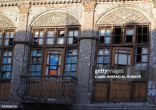 Picture taken on Januray 29, 2018 shows a close up view of a building in the Iraqi capital's Rasheed street, one of the oldest streets of the city.