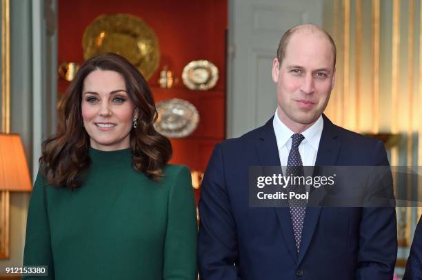 Catherine, Duchess of Cambridge and Prince William, Duke of Cambridge pose ahead of a lunch at the Royal Palace of Stockholm during day one of their...