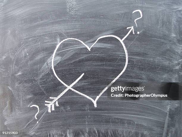 heart drawn on blackboard - chalk heart stock pictures, royalty-free photos & images