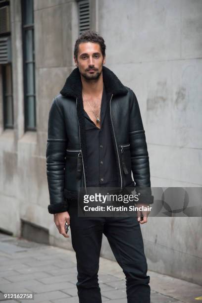 Actor and Made in Chelsea star Hugo Taylor wears a Blood Brother jacket, Maximillian London shirt day 3 of London Mens Fashion Week Autumn/Winter...