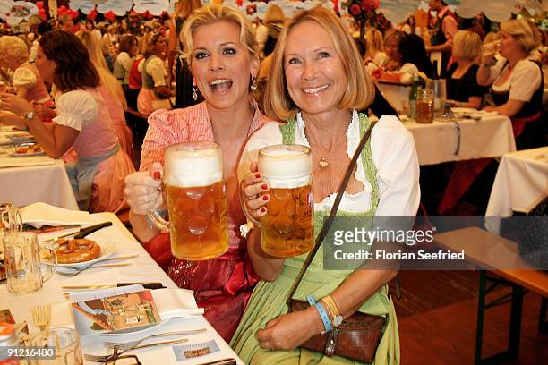 Actress Eva Habermann and Sybille Beckenbauer attend 'Regines Damenwiesn' at Hippodrom at the Theresienwiese on September 28, 2009 in Munich,...