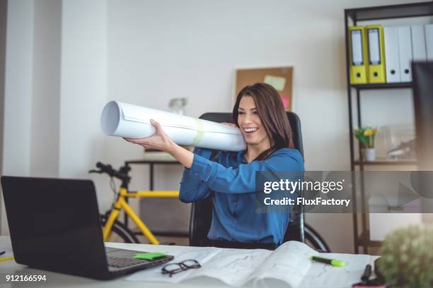 blowing stuff up - female bazooka stock pictures, royalty-free photos & images